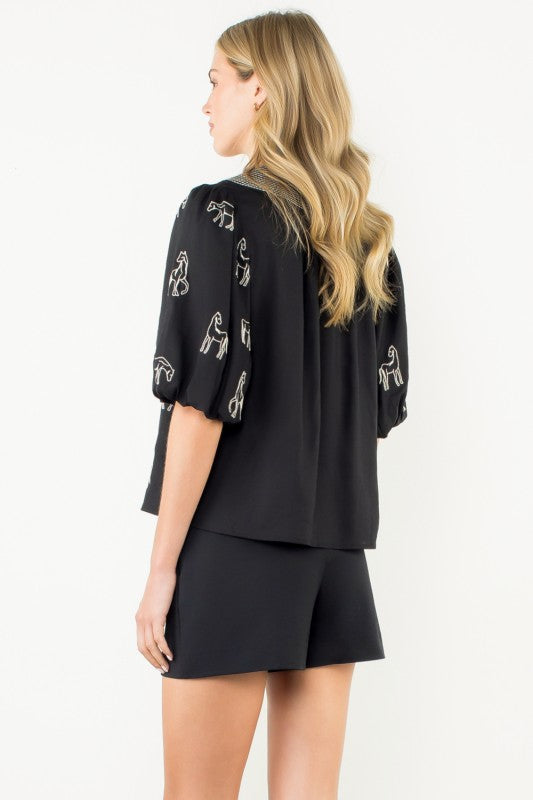 black embroidered shirt